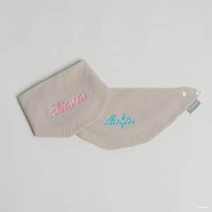 Grey Muslin bib with pink(for girls) or blue(for boys) embroidery